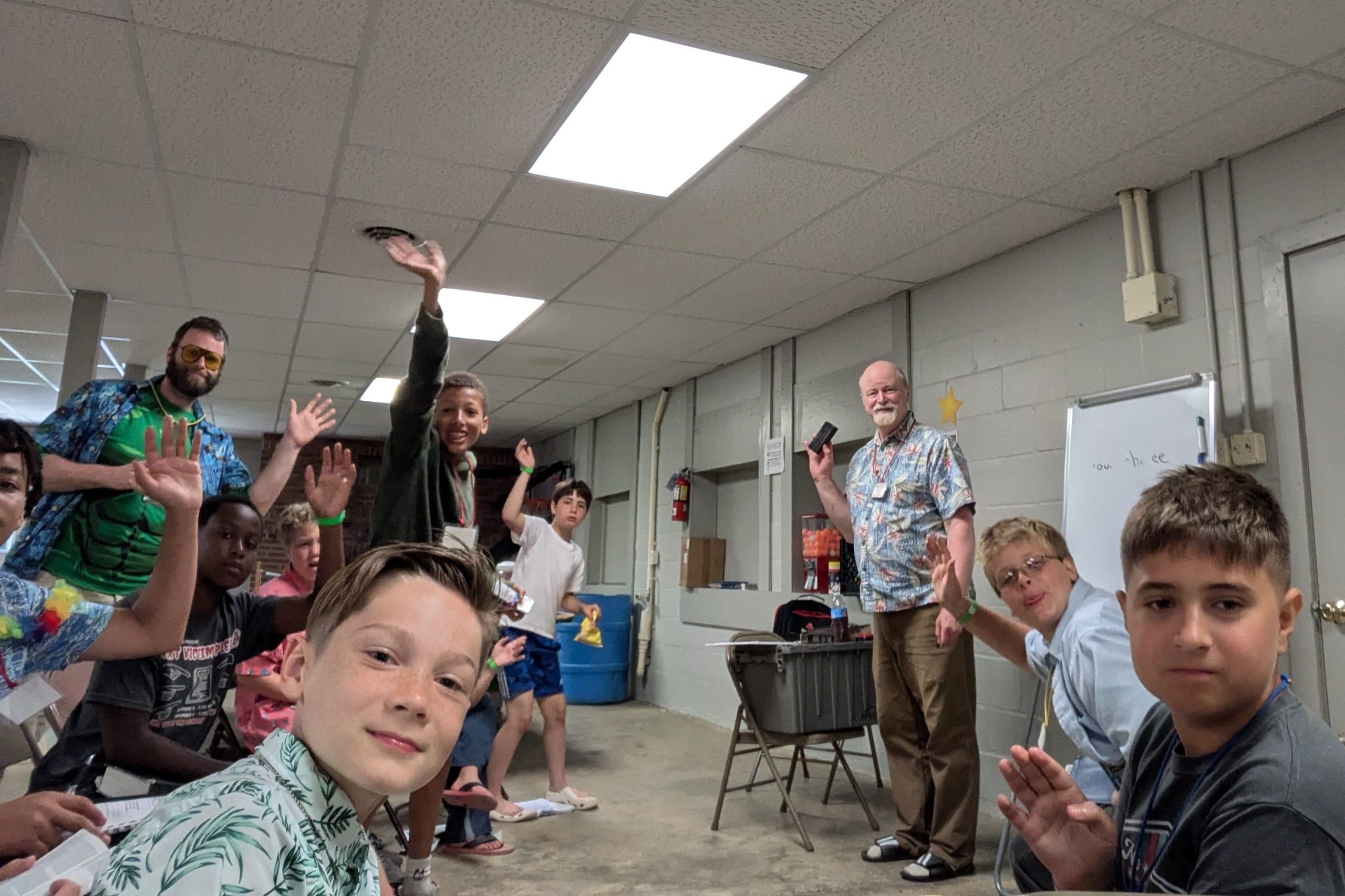 youth waving goodbye