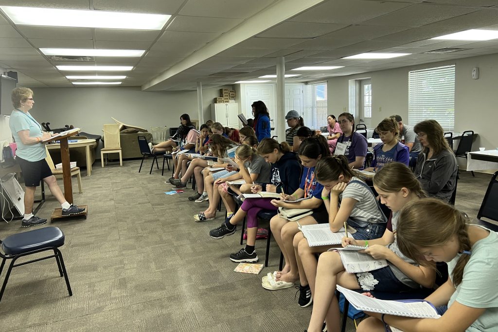 large group of middle school girls at Bible study