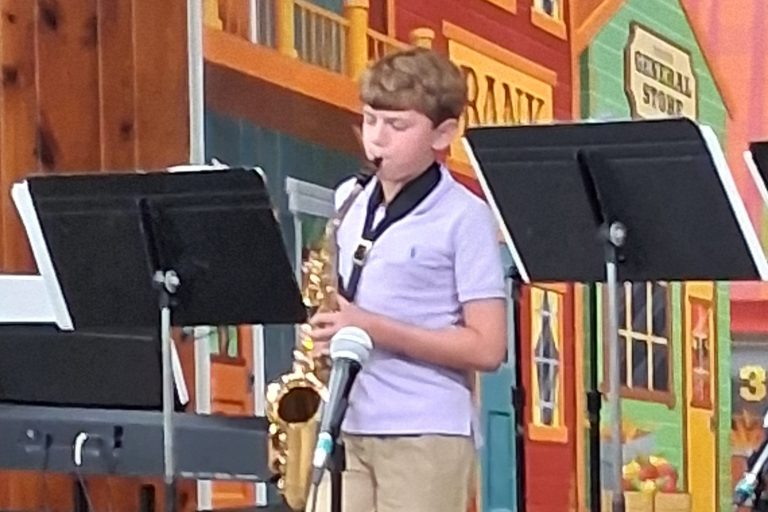 Youth playing the saxophone