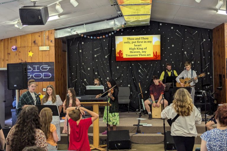 Youth worshipping the Lord in song