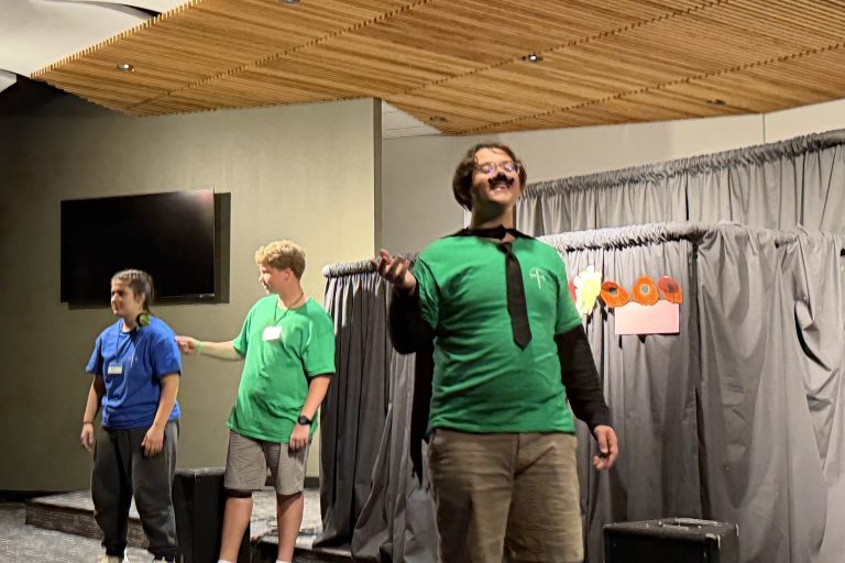 Youth volunteers presenting a drama skit at the mission trip