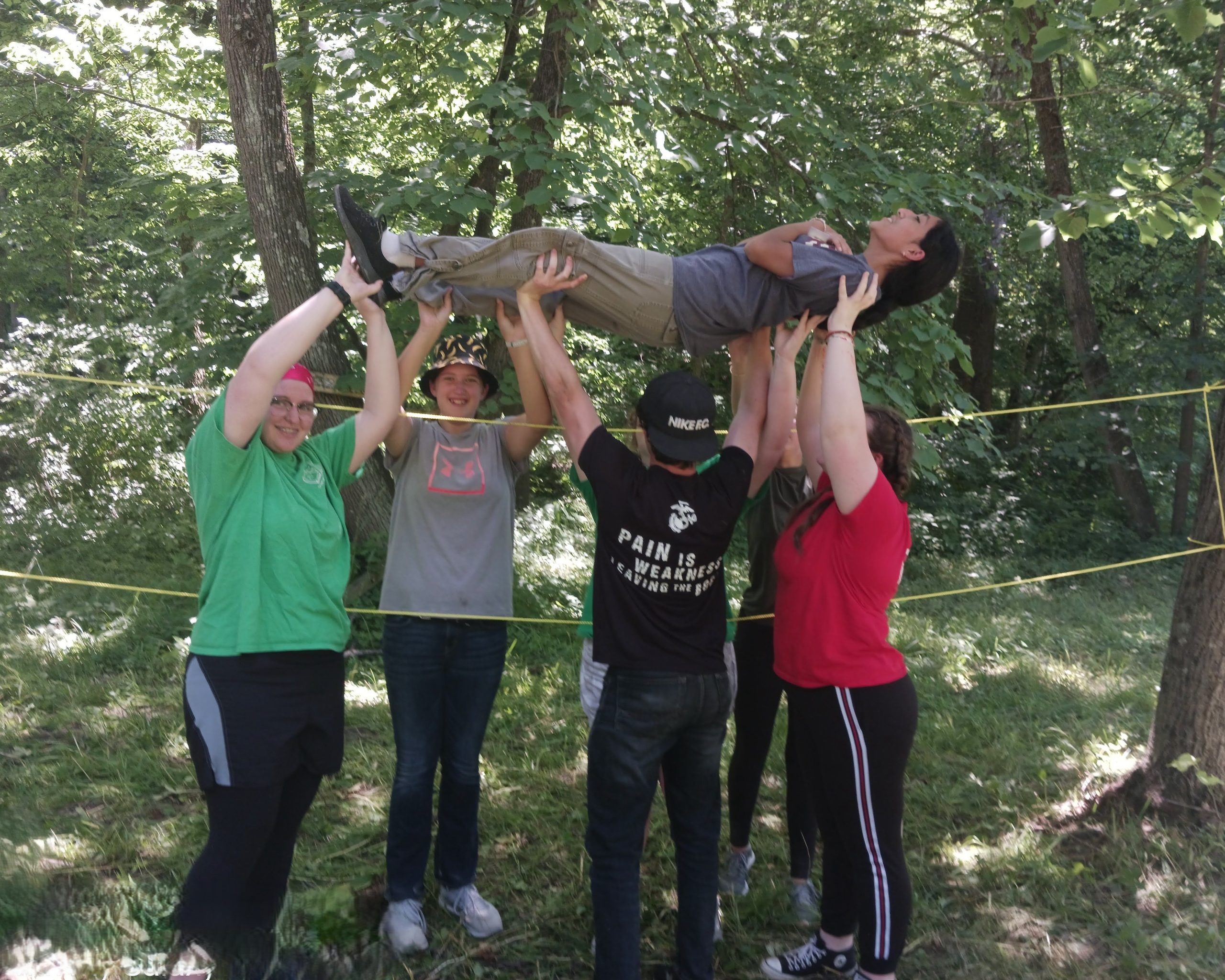 youth participating in team building activity
